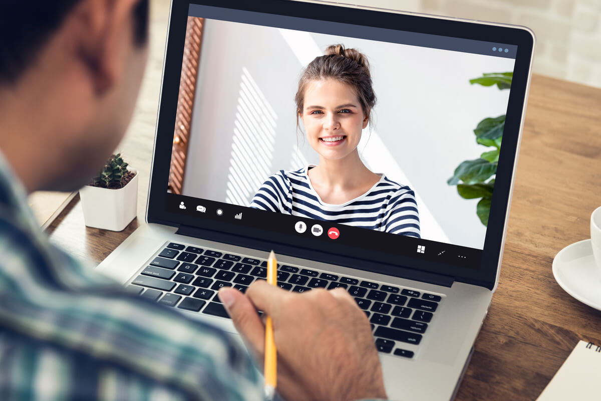 Student taking a live online English lesson